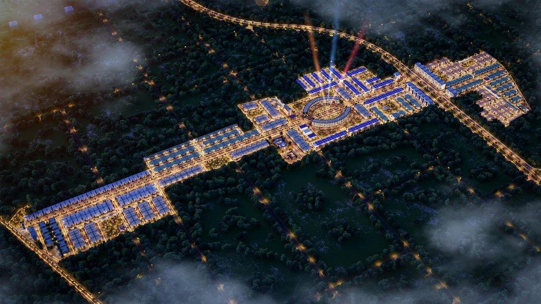 Night aerial — illuminated master plan